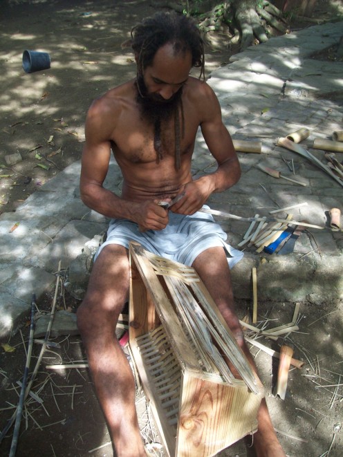 Kwao building a bamboo hive